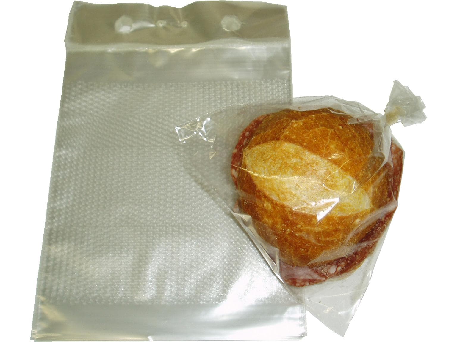 Brötchenbeutel 19 x 15 + 4 cm, geblockt zu 100 Stück, perforiert, transparent