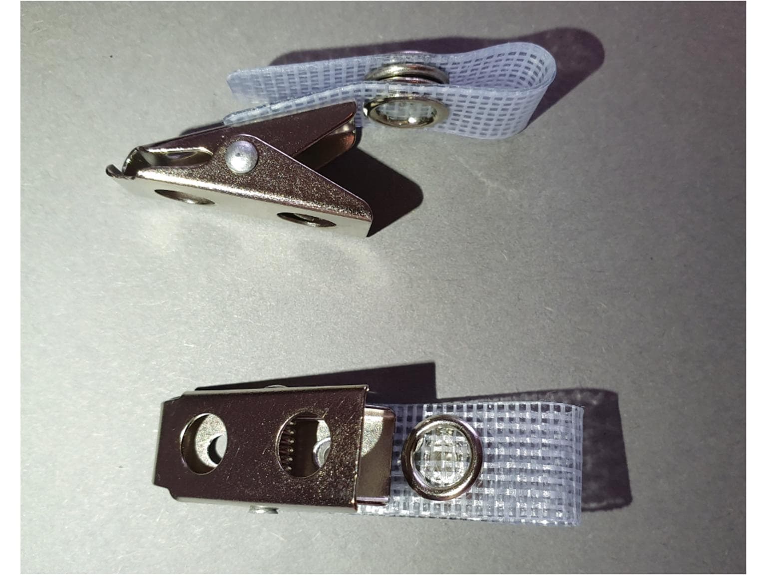 Metallclip Amiclip für JoJo Kittelflaschenhalterung