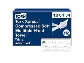 Serviettes pliées Tork Xpress® douces et comprimées, blanches.